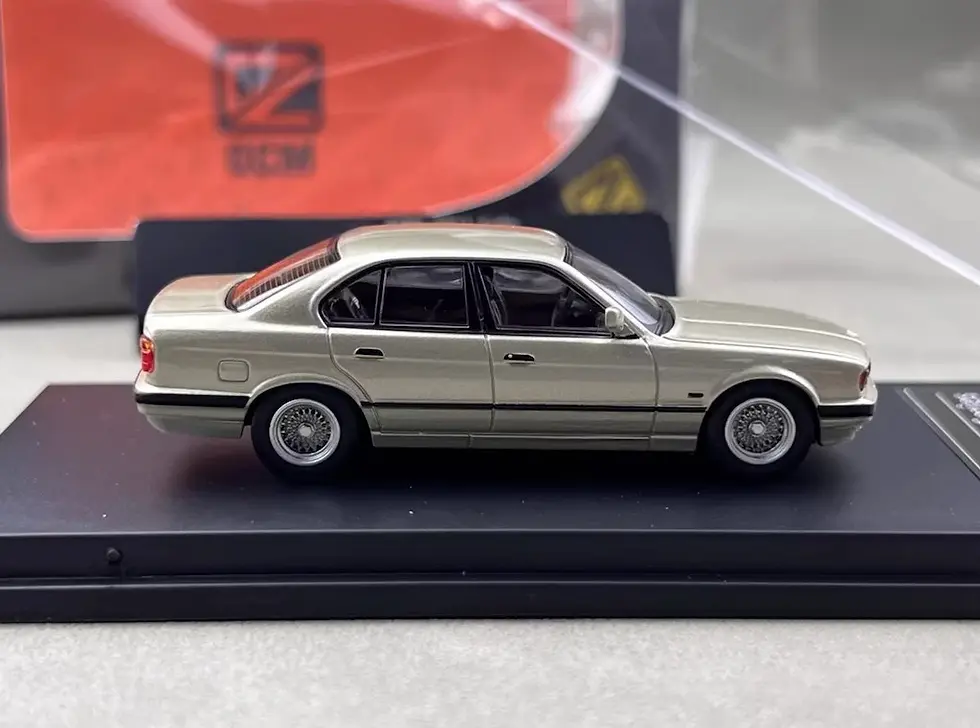 Thumbnail: BMW E32 7 SERIES CASHMERE BEAGLE GOLD 1/64 DIECAST CAR MODEL BY DCM