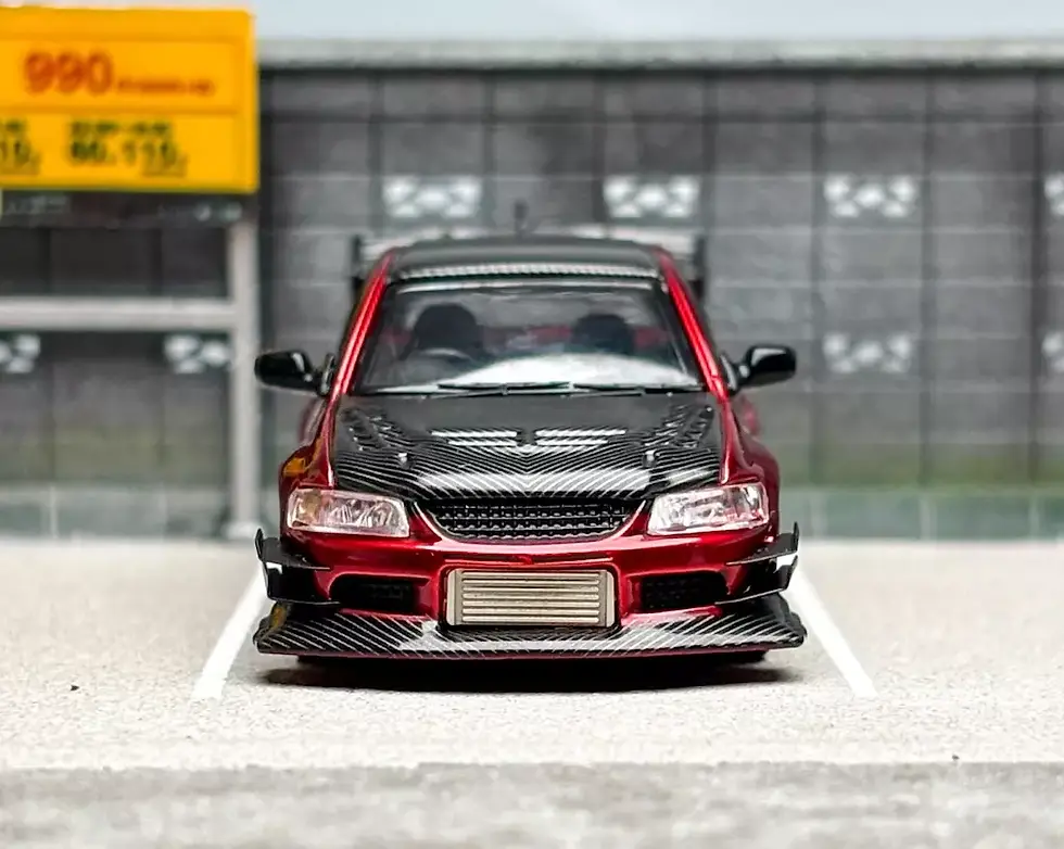 Thumbnail: MITSUBISHI LANCER EVO IX CARBON FIBER RED WITH EXTRA WHEELS 1/64 CAR CM MODELS