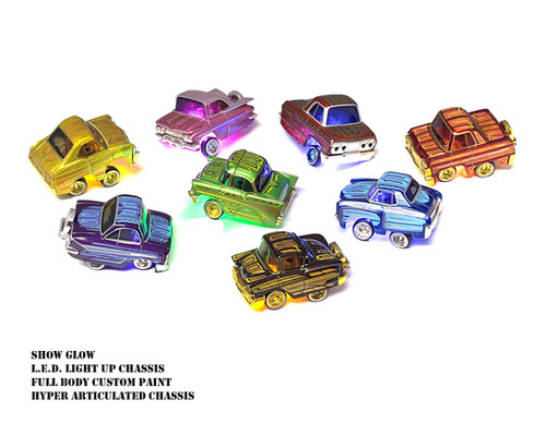 LOWRIDERS LED LIGHT UP CHASSIS SHOW GLOW SET OF 8 1/64 BY CAR