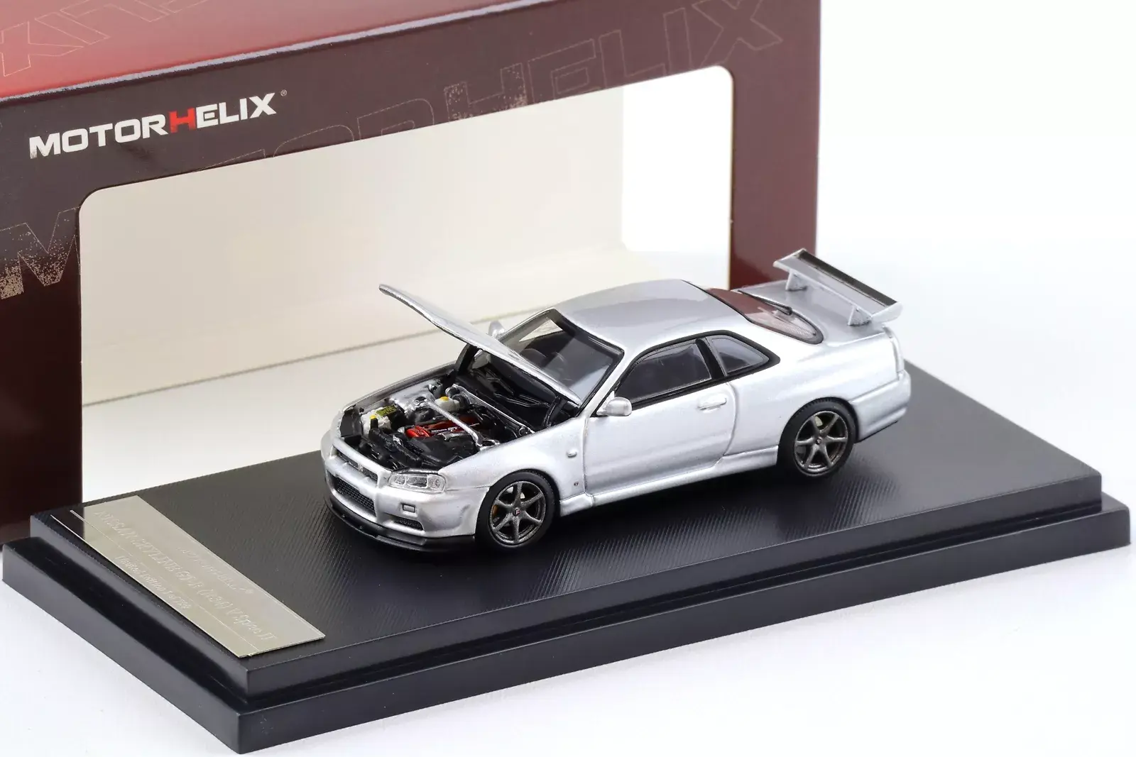 NISSAN SKYLINE GT-R R34 V-SPEC II SILVER HOOD OPENS 1/64 DIECAST CAR MOTOR HELIX
