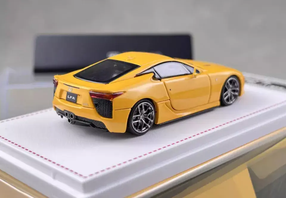Thumbnail: LEXUS LFA PEARL YELLOW WITH HOOD OPENING 1/64 SCALE DIECAST CAR BY FOCAL HORIZON