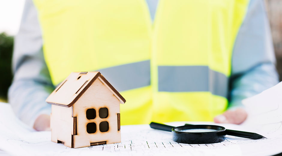 close-up-machete-house-with-magnifying-glass.jpg