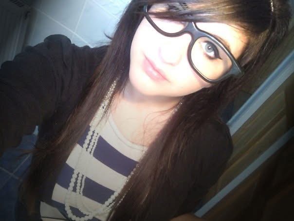 woman wearing black glasses