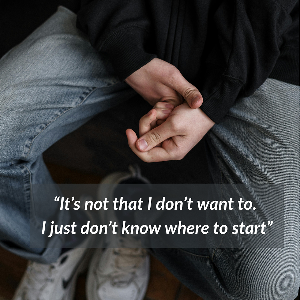 Teenage hands clasped, sitting on edge of seat, indicating hesitation to begin task