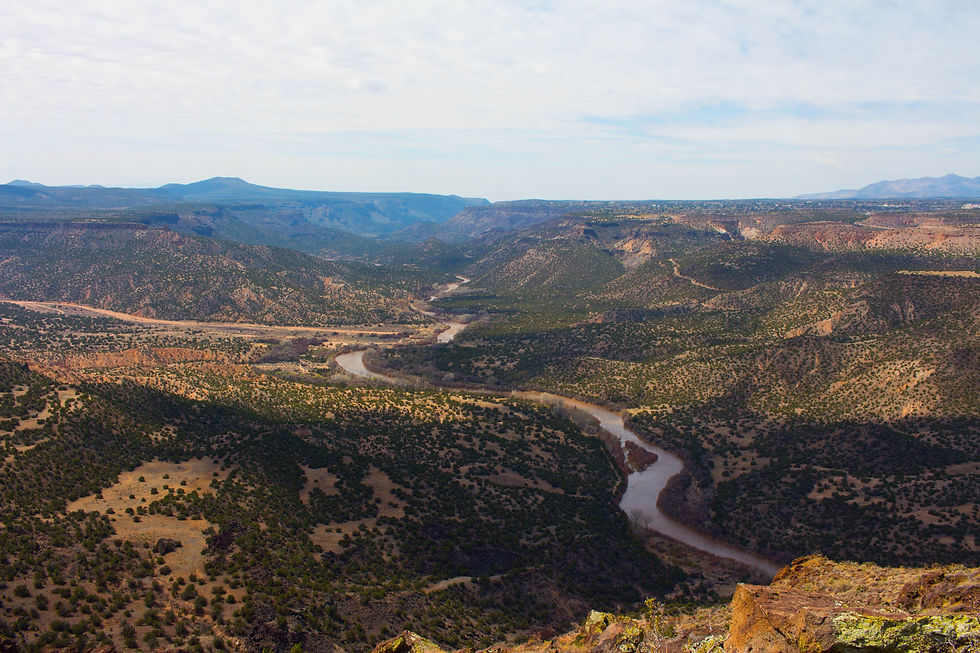 A river winding through desert valleys.