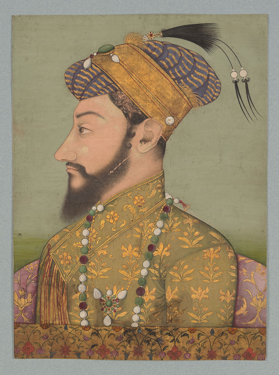 Portrait of a bearded man in ornate attire, featuring gold headwear with jewels and feathers, and a richly embroidered robe, evoking regality and elegance.