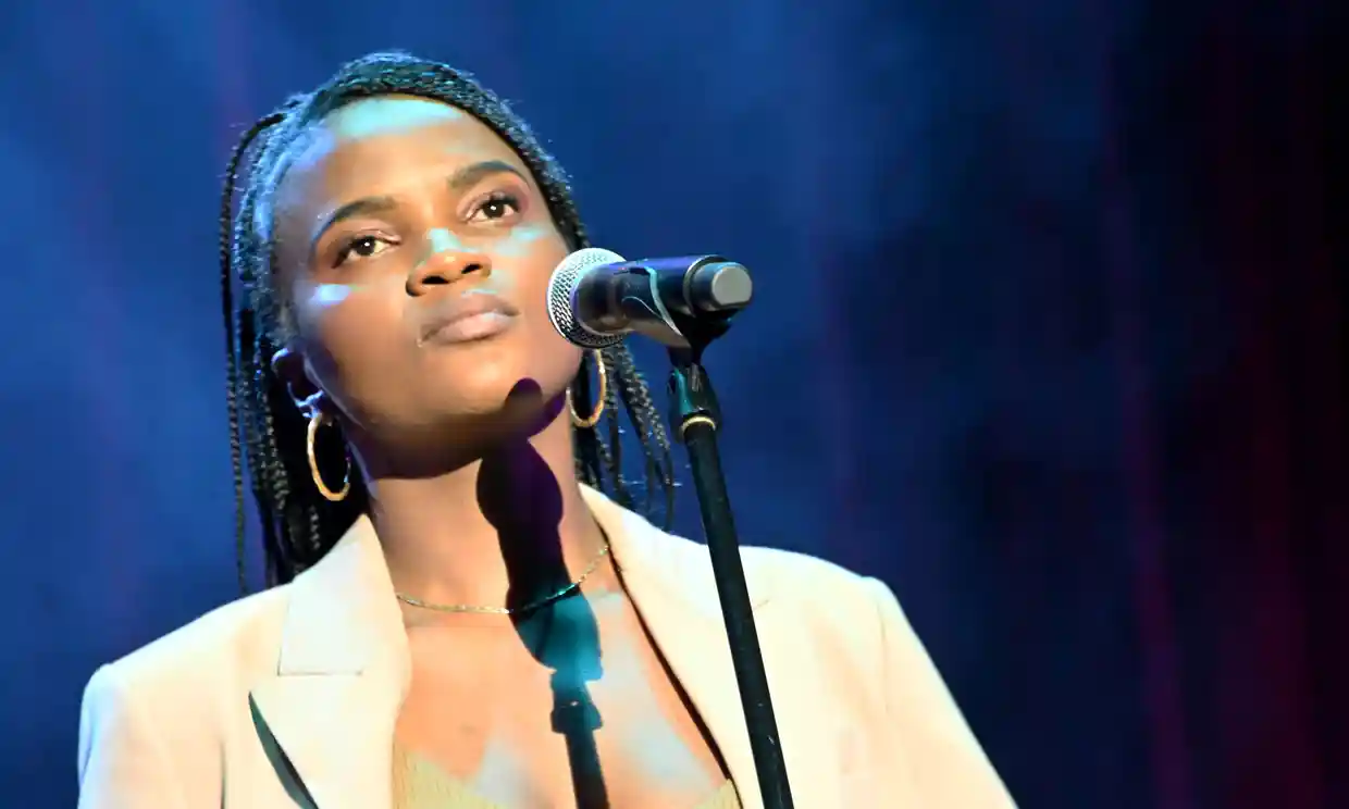 The South African singer Ami Faku on stage.