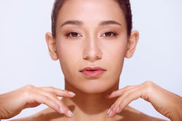 Soft glow beauty portrait with natural makeup, luminous skin, and polished brows, makeup and hair by Boston makeup artist Minah Campos