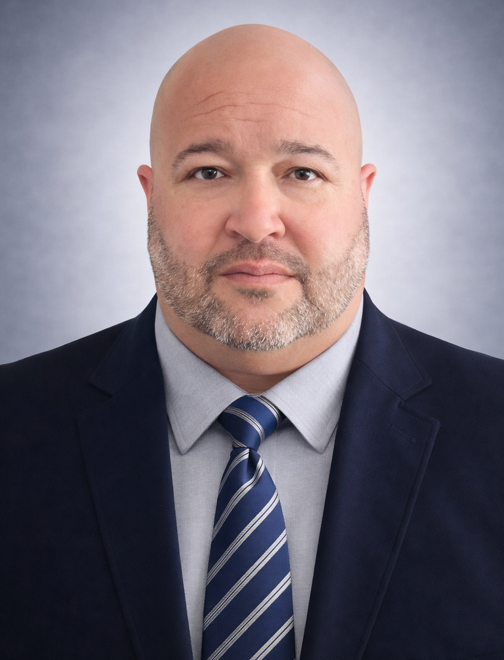 Angel Alvarado head Shot with Tie.png