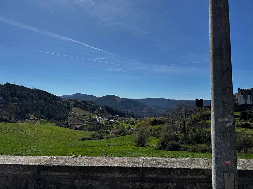 Another small town nestled in a green mountain valley.