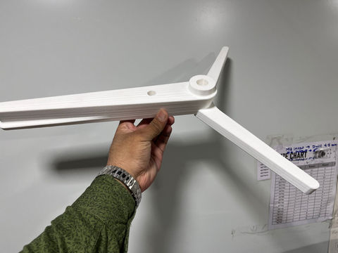 White 3D printed electronic enclosure parts.