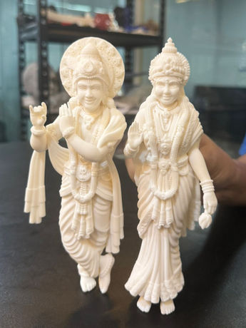 Radha Krishna standing sculpture with decorative handcrafted finish.