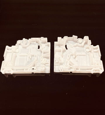 3D printed MCB component prototype in white resin.