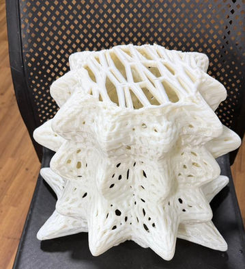 Detailed artistic sculpture made using resin 3D printing.