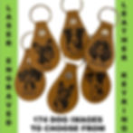 image of 6 keyrings laser engraved with a dog face and custom name
