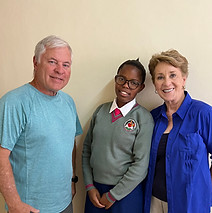 John, Yvonne, and Nicki in Yvonne's school
