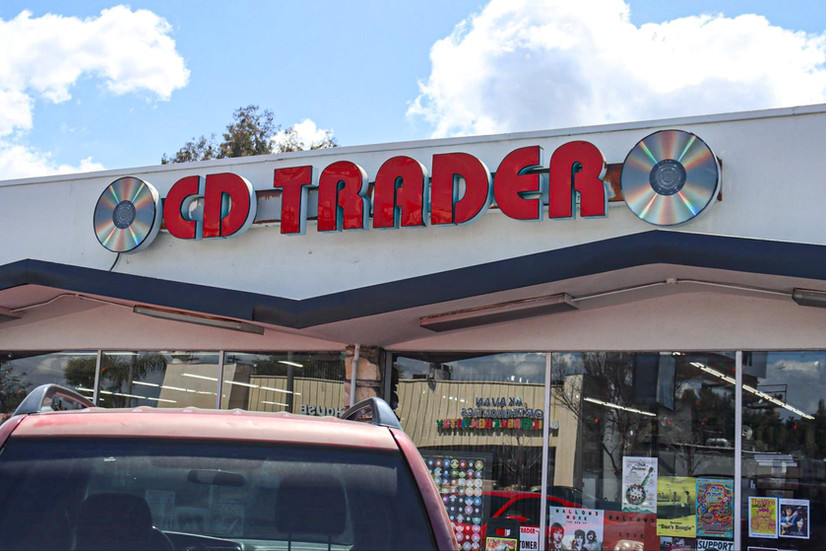 CD Trader’s main store sign on Ventura Blvd in Tarzana. (Madeleine Christian)