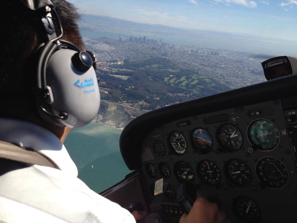Chris’s view from the pilot seat of his Cessna 172, flying over San Francisco in 2010.” (Photo credit April Hickey.)