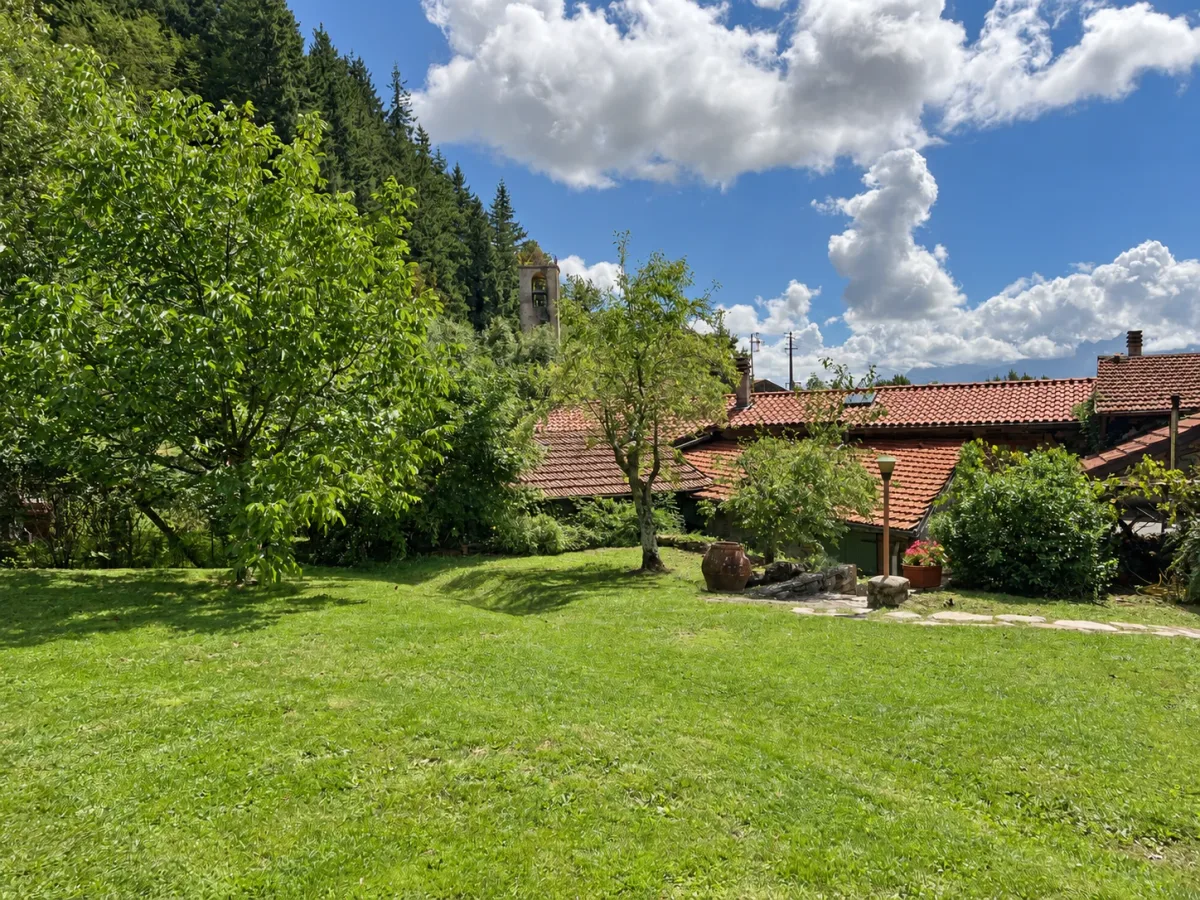 The lawn and the stone houses