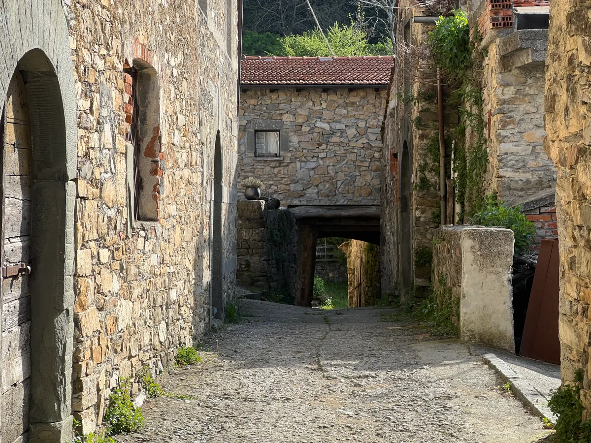 A passage between the stone houses