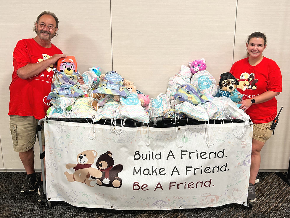 Children's Toy Fund, Inc, Louis and Ashley, gather the stuffed animals to donate to Akron Children's Hospital in Tom Benson Hall of Fame locker rooms, Canton, Ohio, June 2025.