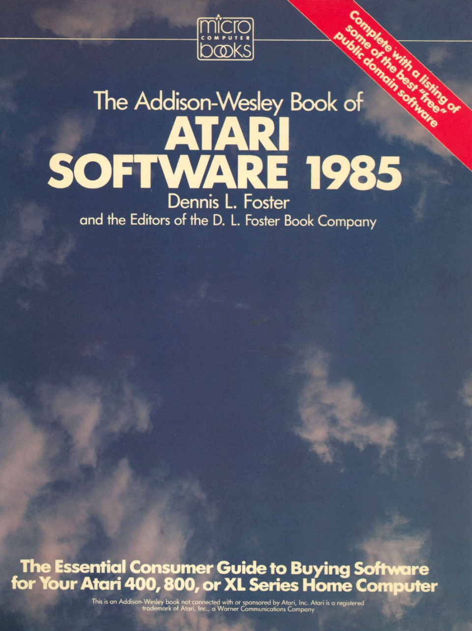Cover for "The Addison-Wesley Book of Atari Software 1985" featuring the title in large white block letters over an image of a blue, cloudy sky.