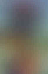 Book cover for "QuestBusters: The Book of Clues" featuring the red QuestBusters logo and the title in large white letters, above an image of a caped wizard casting a fireball spell, standing next to a woman with a green flag, as a dragon attacks them from behind. Additional text reads "Complete solutions for 35 of today's hottest computer games!"