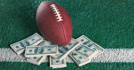 American Football with Stacks of Money