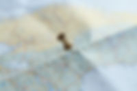 traveling-map-with-golden-pin.jpg