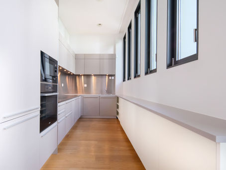 Cuisine moderne d'un bien immobilier photographié à Genève