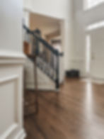 Entryway with stairs and front door