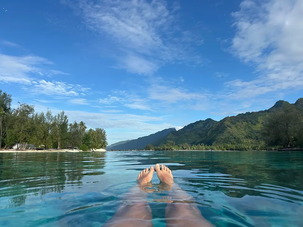 Feet floating in clear water, perfect for snorkeling in Moorea
