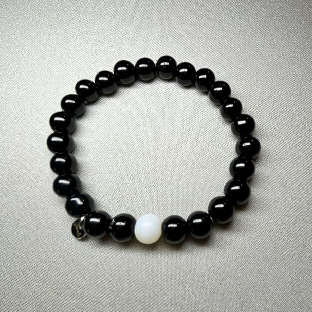 7" bracelet with Black Onyx and White Quartz by Joveli Designs.