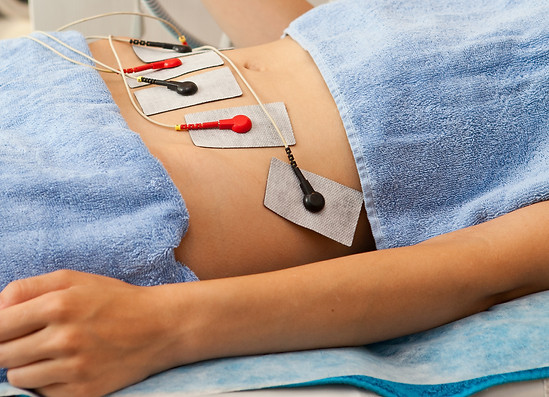 Body treatment with Tissue electron stimulation on young woman