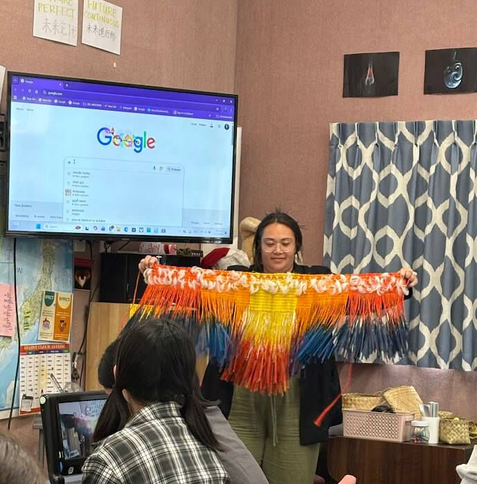 Students learning about Māori culture and traditions during a special classroom presentation.