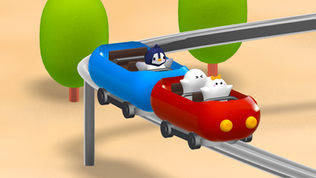 Cartoon penguin and white figures ride a red and blue roller coaster on a track. Green trees in background; playful atmosphere.