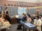 Students improving their listening and communication skills during an interactive guest speaker session at SCLI.