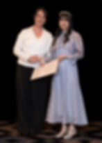 A student celebrating her achievement at the SCLI graduation ceremony after completing her study experience in New Zealand.