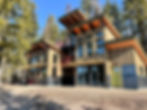 Custom lakefront home surrounded by pine trees on Priest Lake.