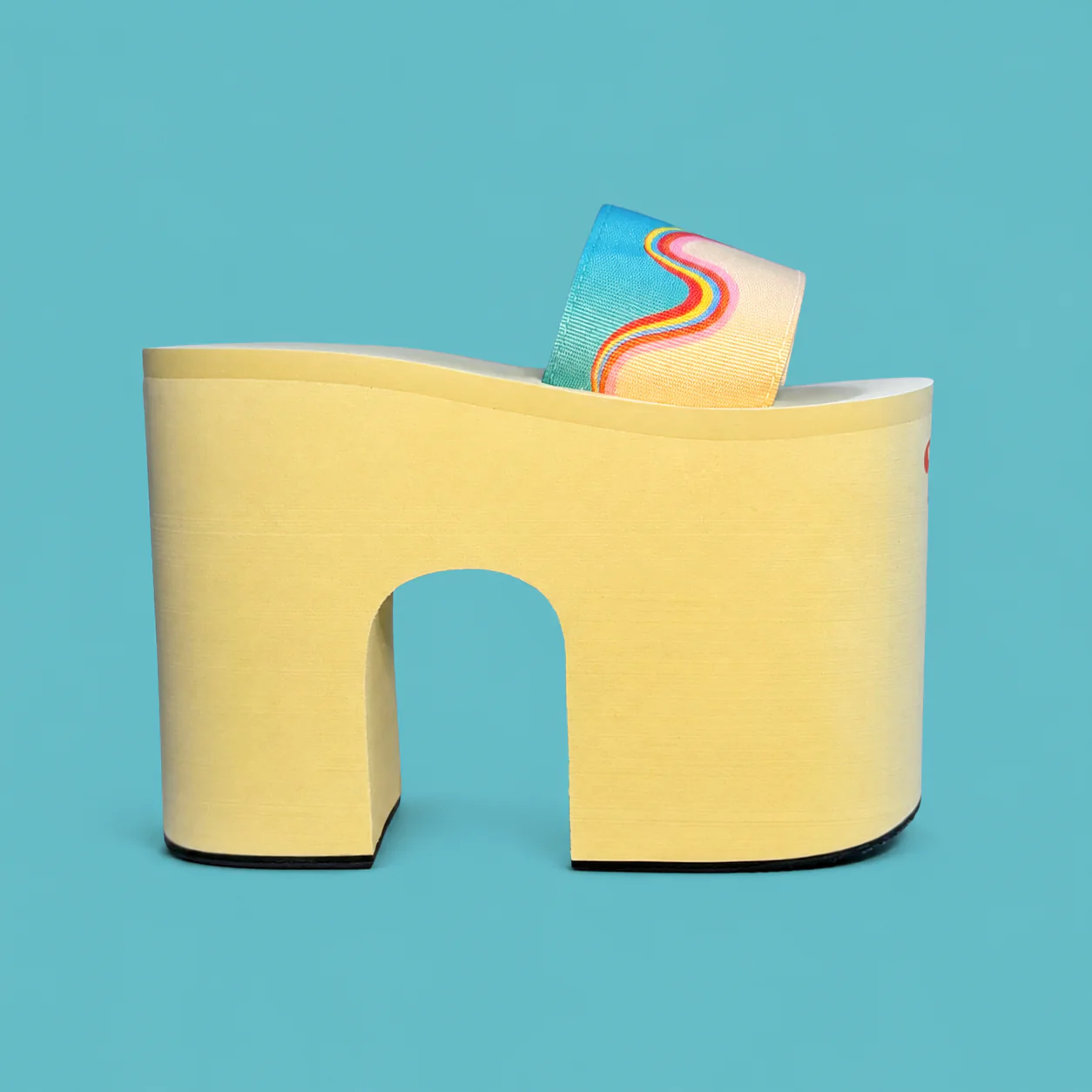 Close-up of the Let Loose SH*T Shoes, chunky cream platform sandals designed to recreate a natural squatting position while using the toilet.