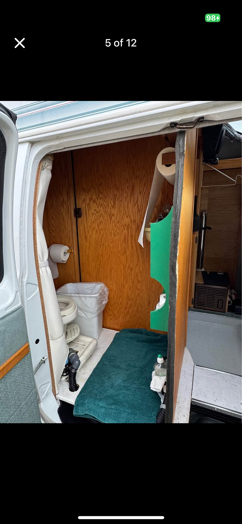 Modified bathroom of a 1996 Roadtrek 170 Popular - photo from outside of vehicle