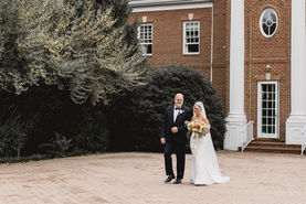 father walking bride down aisle