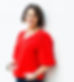 Self portrait of Kerry wearing a red shirt and blue jeans