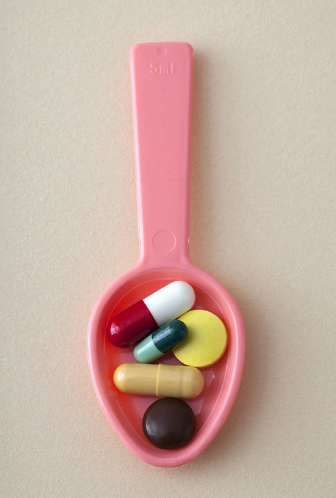 Pink Spoon With Pills