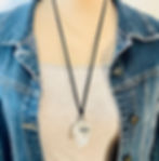 Thumbnail: large, wire-wrapped raw quartz crystal pendant with a silver dragonfly charm, black cord necklace 