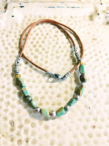 turquoise & silver beads on rust colored faux suede necklace