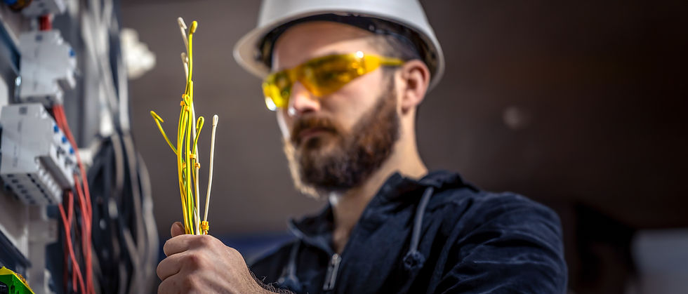 male-electrician-electrical-technician-working-switchboard.jpg