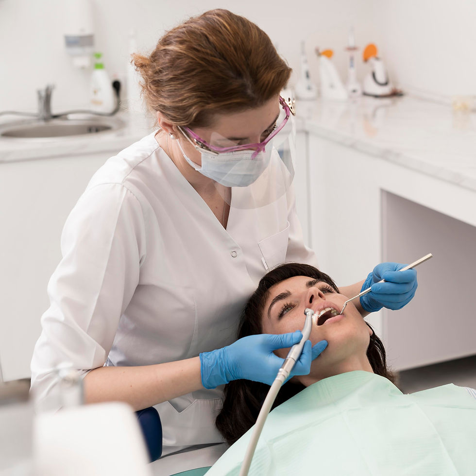 female-patient-having-procedure-done-dentist.jpg