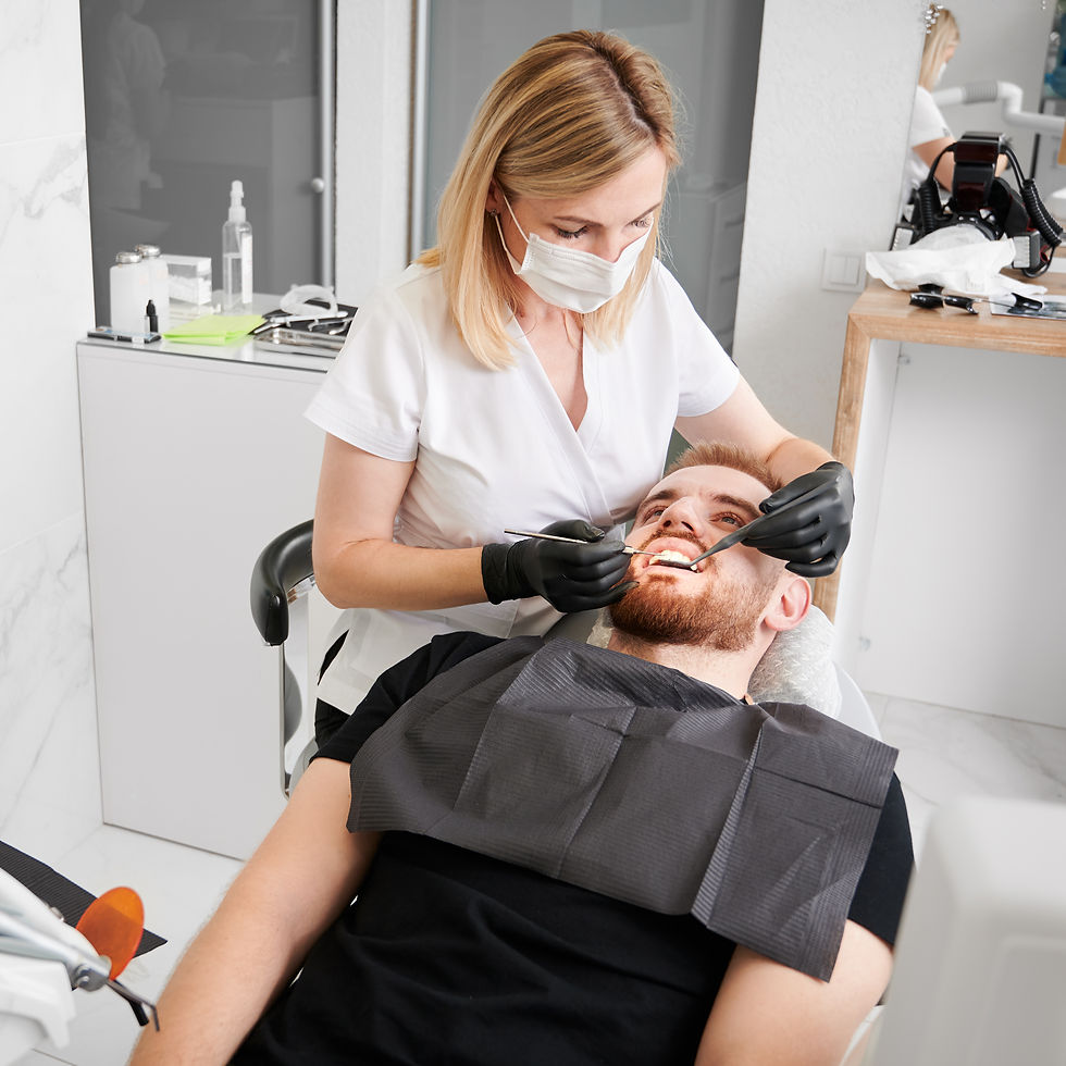 female-dentist-work-man-s-teeth-check-up-dentist-office.jpg
