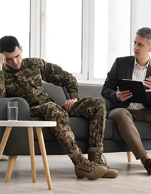 imageye___-_imgi_7_professional-psychotherapist-working-with-military-man-office_495423-85